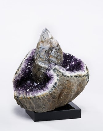 Calcite, Pyrite, and Goethite on Amethyst