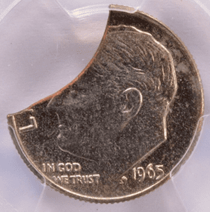 1965 dime with a clipped portion