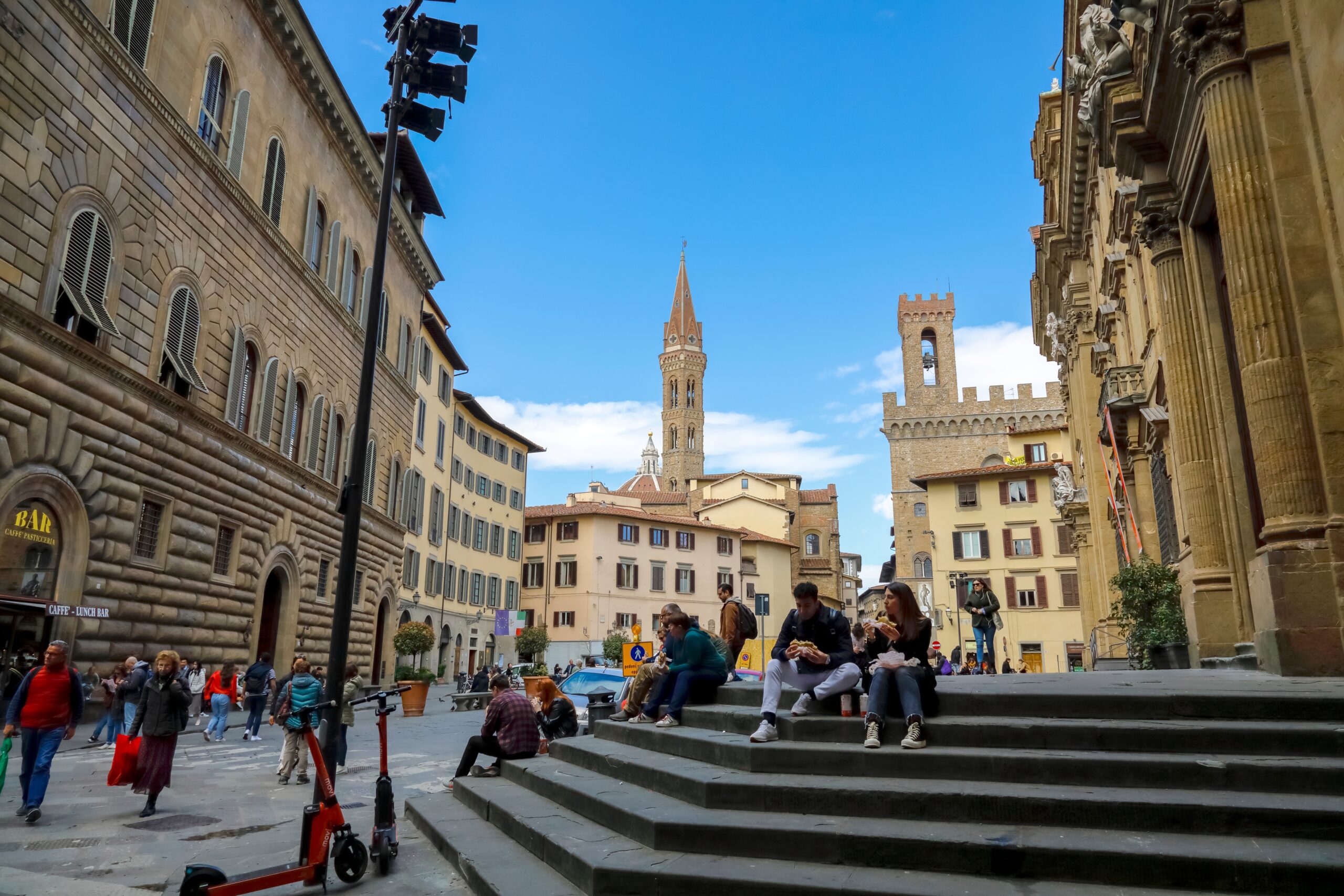 Sitting on public steps in Florence, Italy