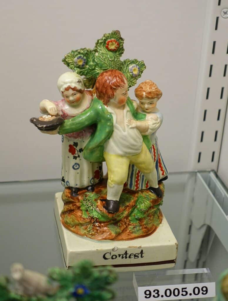 Staffordshire Pottery Figure with Bocage “Scuffle”