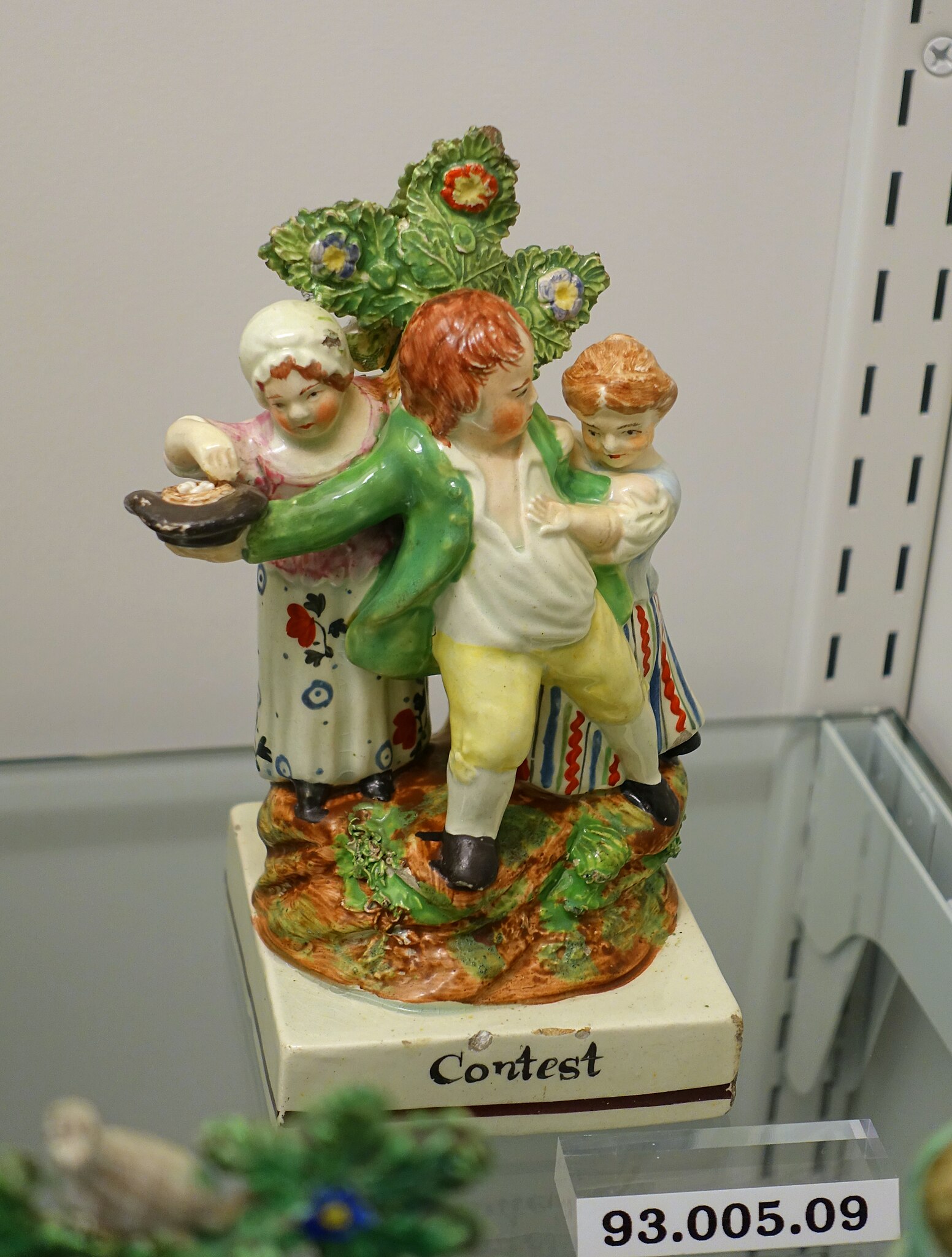 Staffordshire Pottery Figure with Bocage “Scuffle”