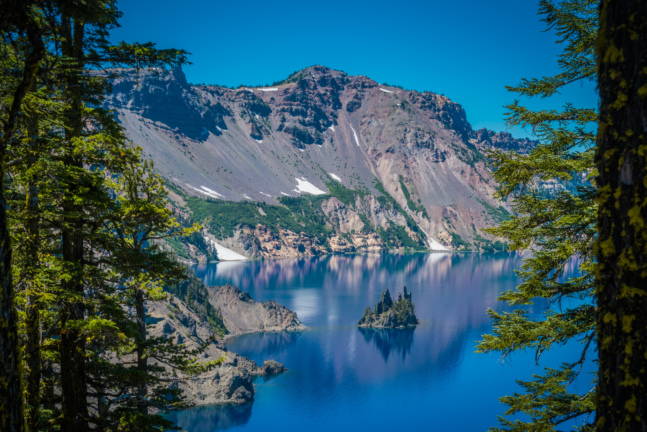 Crater Lake, Oregon, USA (Deep Blue Color and Floating Trees)